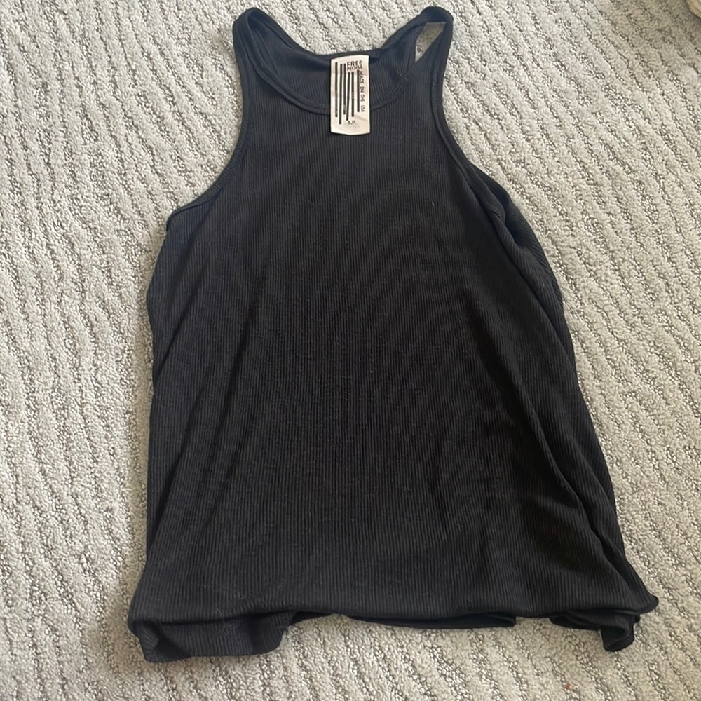 Free people black tank. Longer length. Perfect condition.